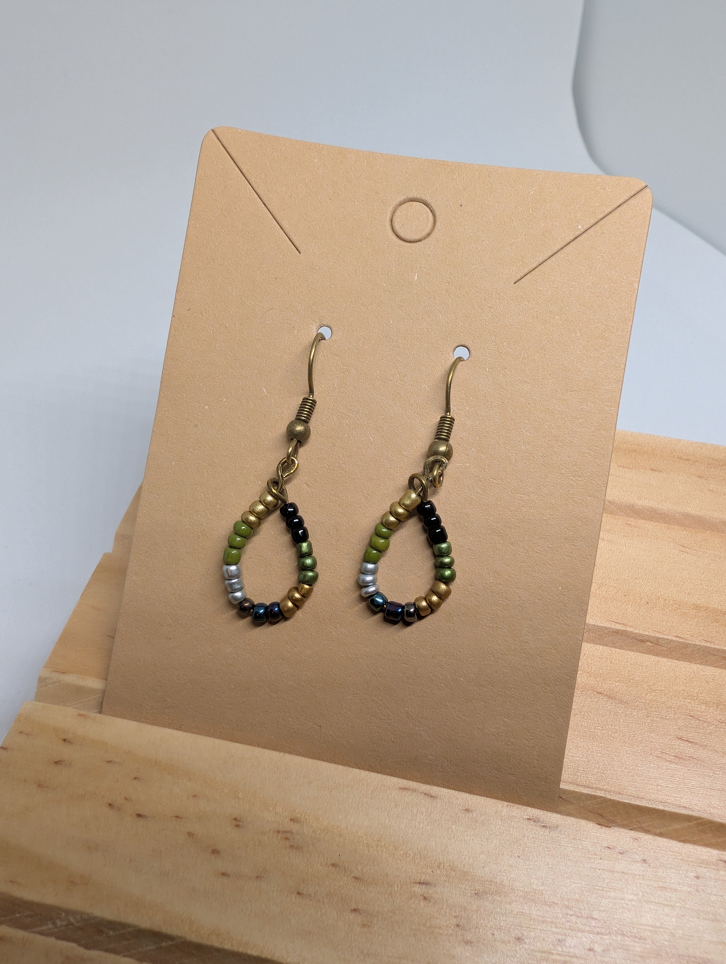 Olive And Bronze Drops, handmade beaded earrings in green, black, bronze and silver