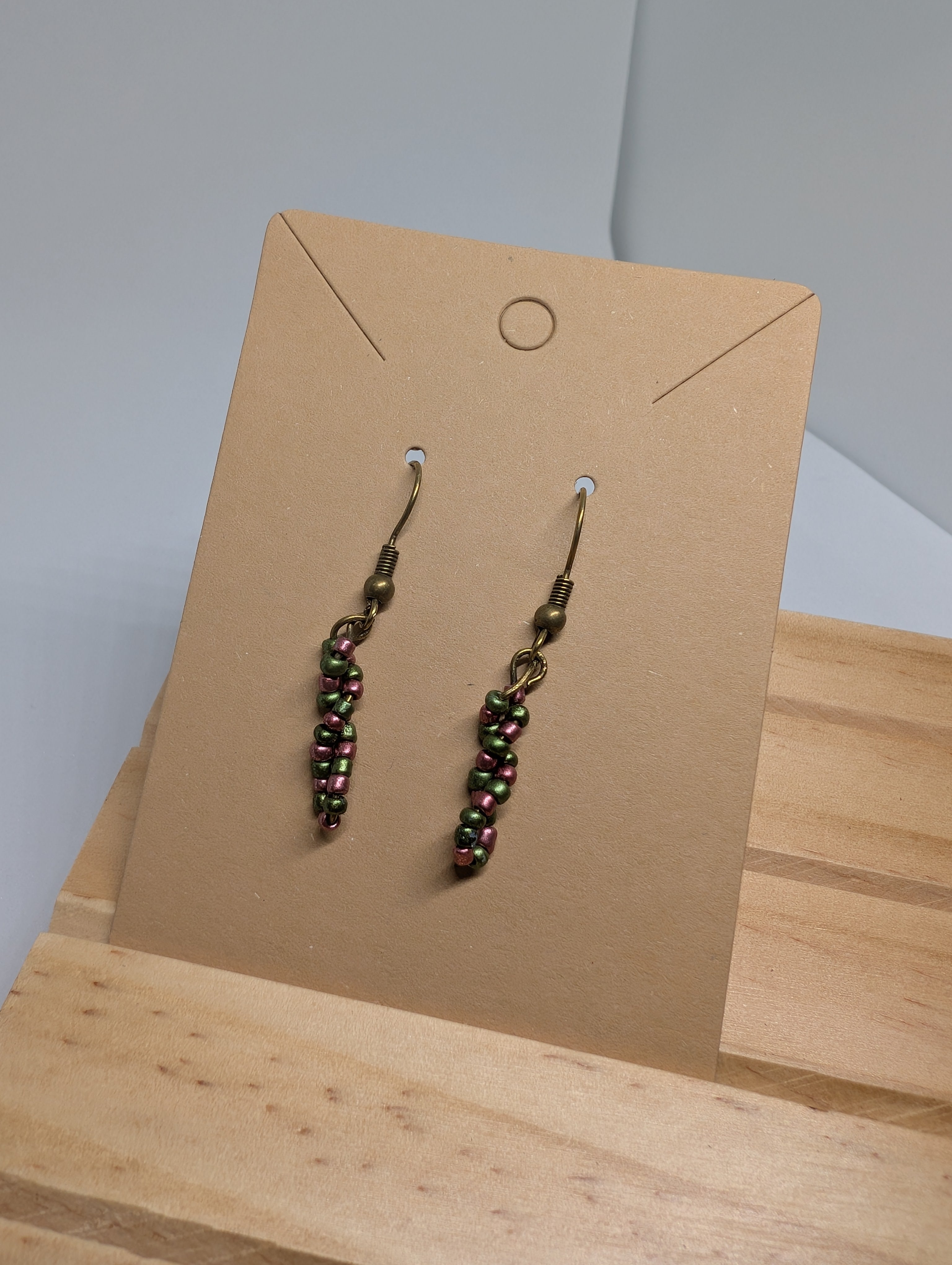 Iridescent Olive Drops, handmade beaded earrings in green, purple and bronze