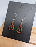 Amber Spiral Curls, handmade beaded earrings in orange, pink and silver