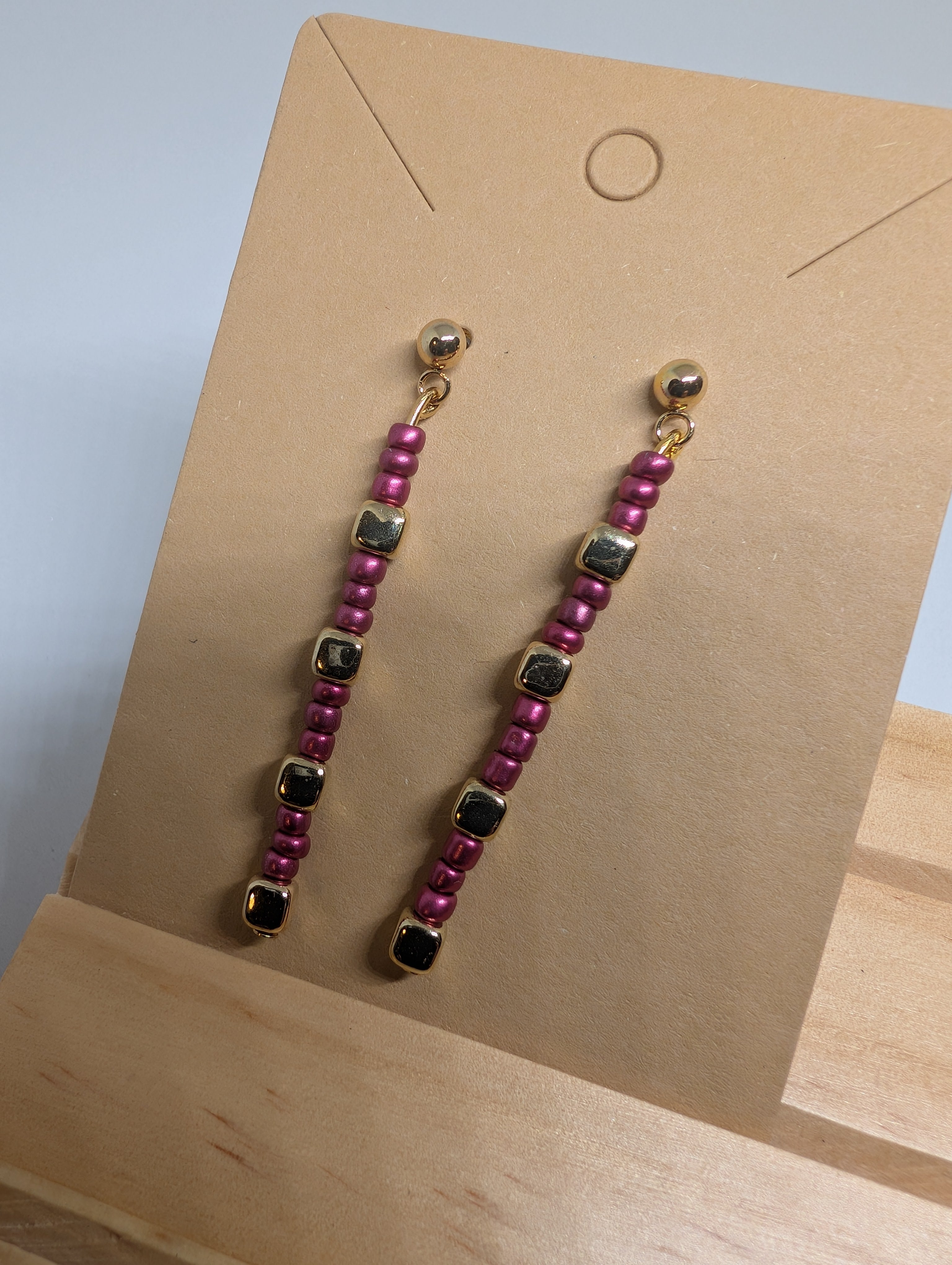 Magenta Ladder Line, handmade beaded earrings in pink, gold and black