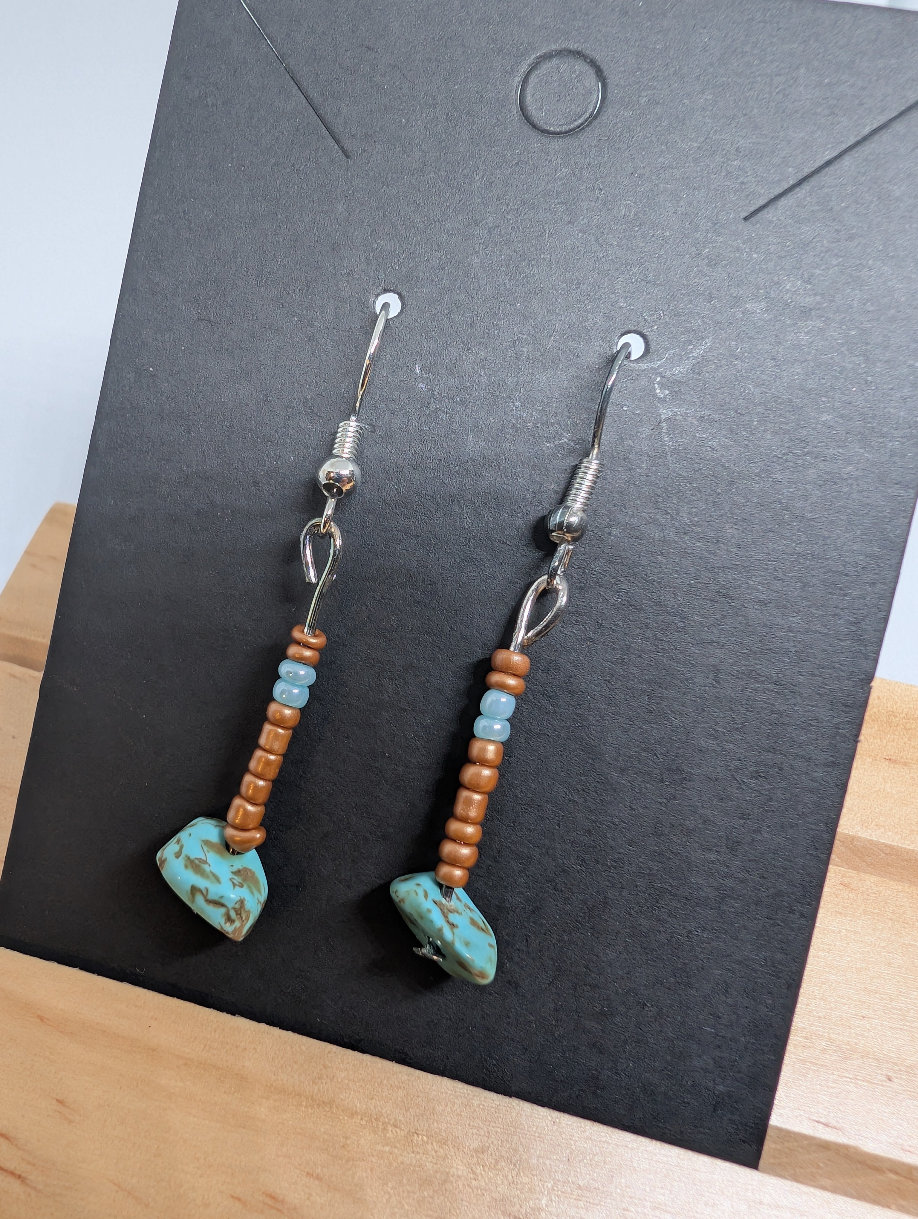 Driftwood And Sky, handmade beaded earrings in brown, blue and silver