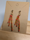 Amber And Coral Fringe, handmade beaded earrings in orange, brown and gold