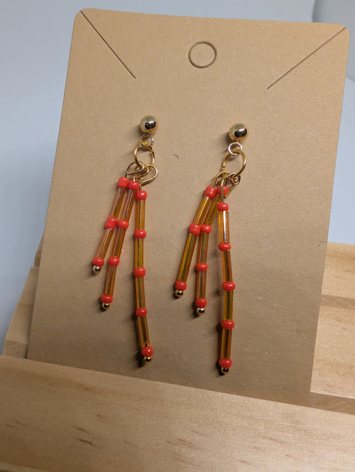 Amber And Coral Fringe, handmade beaded earrings in orange, brown and gold