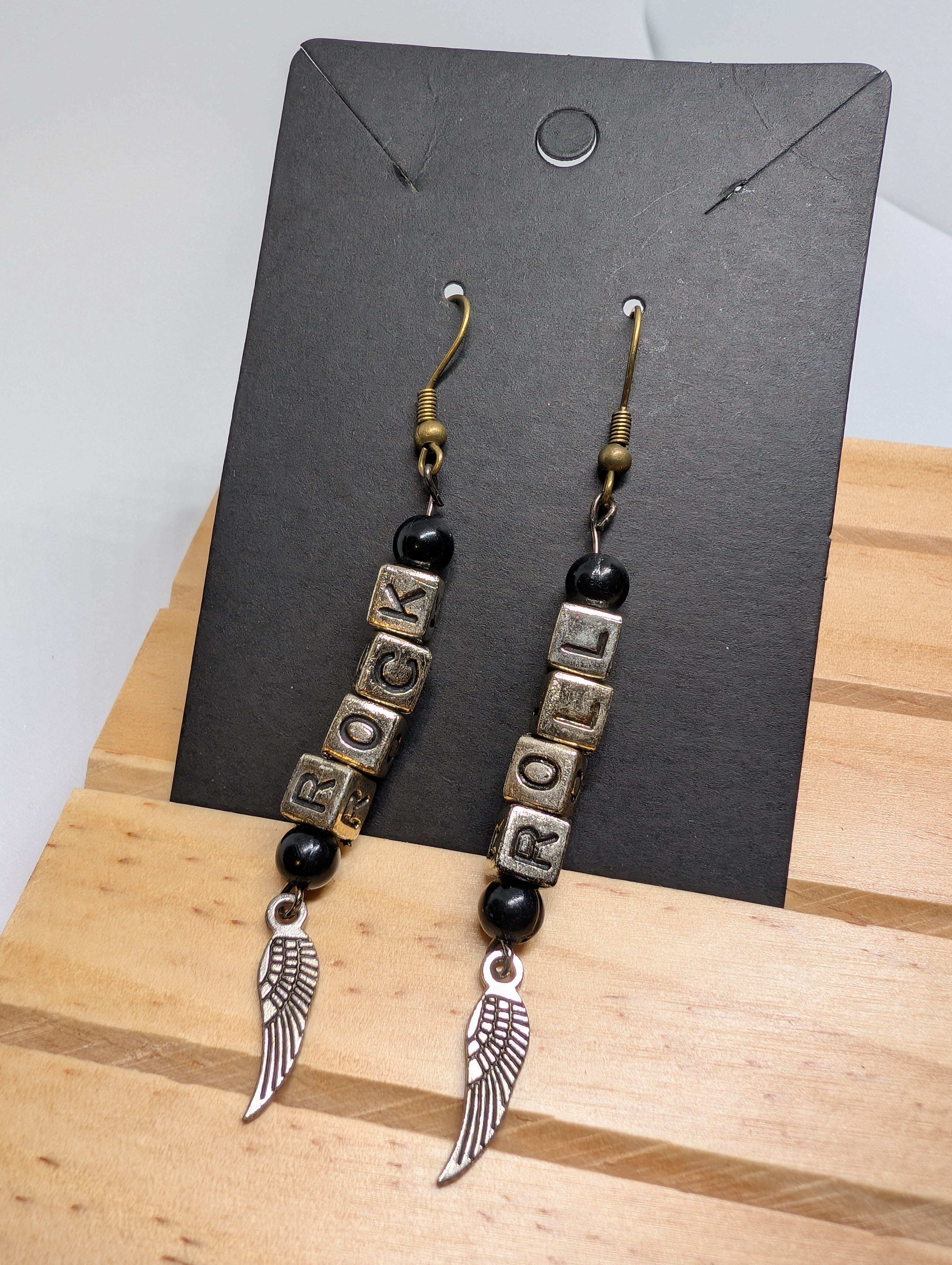 Rock And Roll Wing Drops, handmade beaded earrings in black, silver and bronze