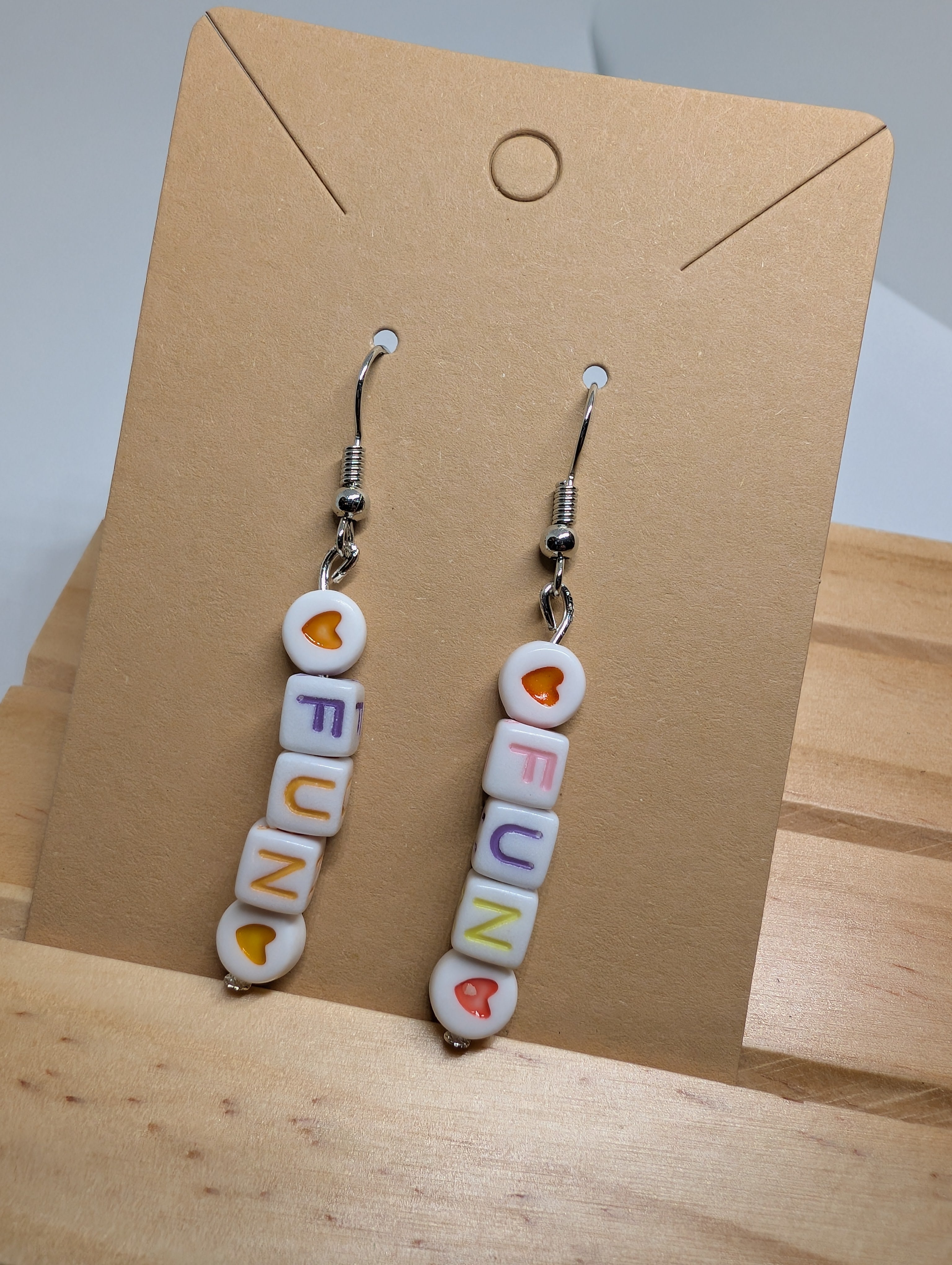 Fun Letter Heart Drops, handmade beaded earrings in white, orange, purple and silver