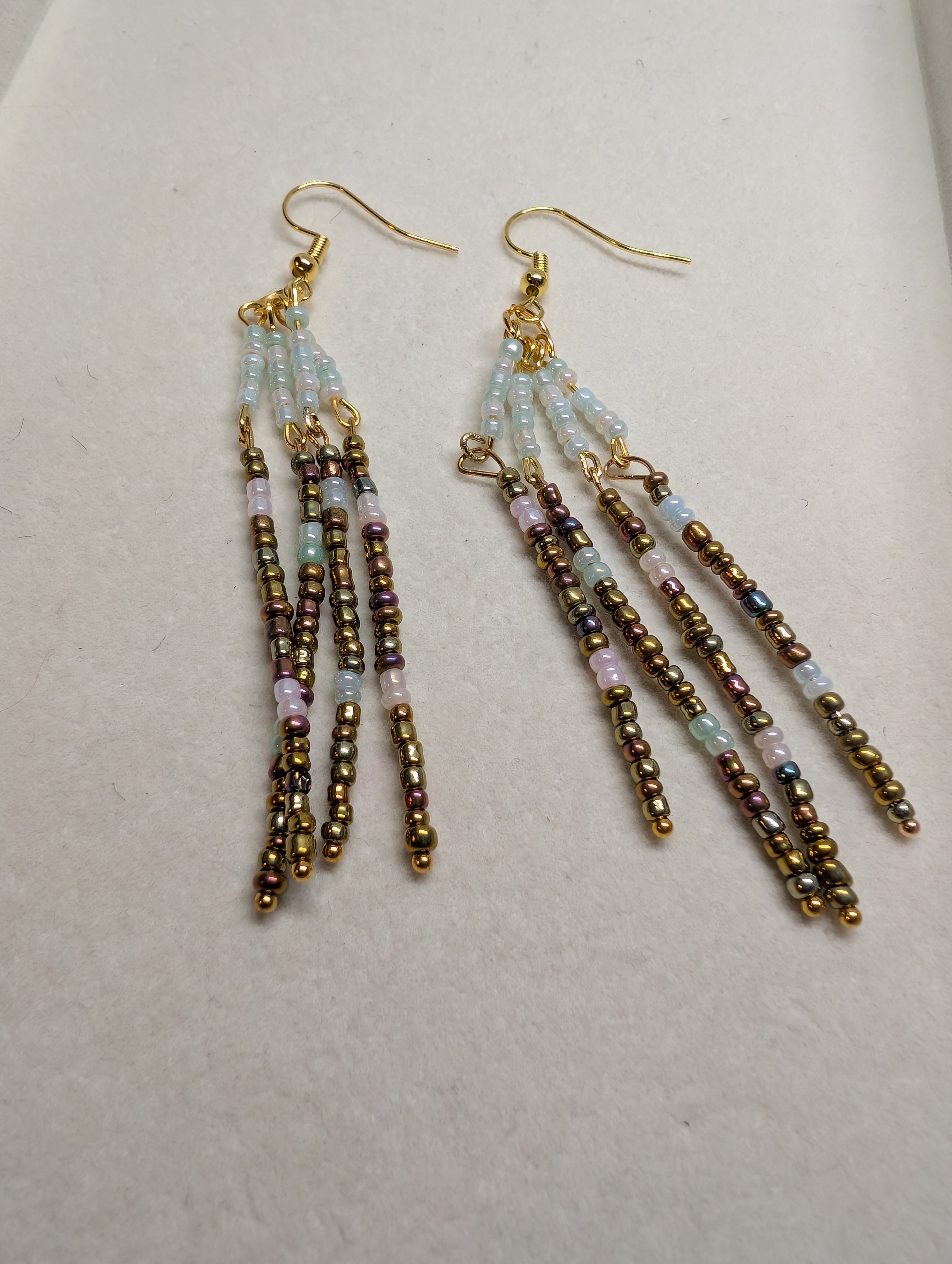 Bronze Twilight Strands, handmade beaded earrings in bronze, gold, blue and pink