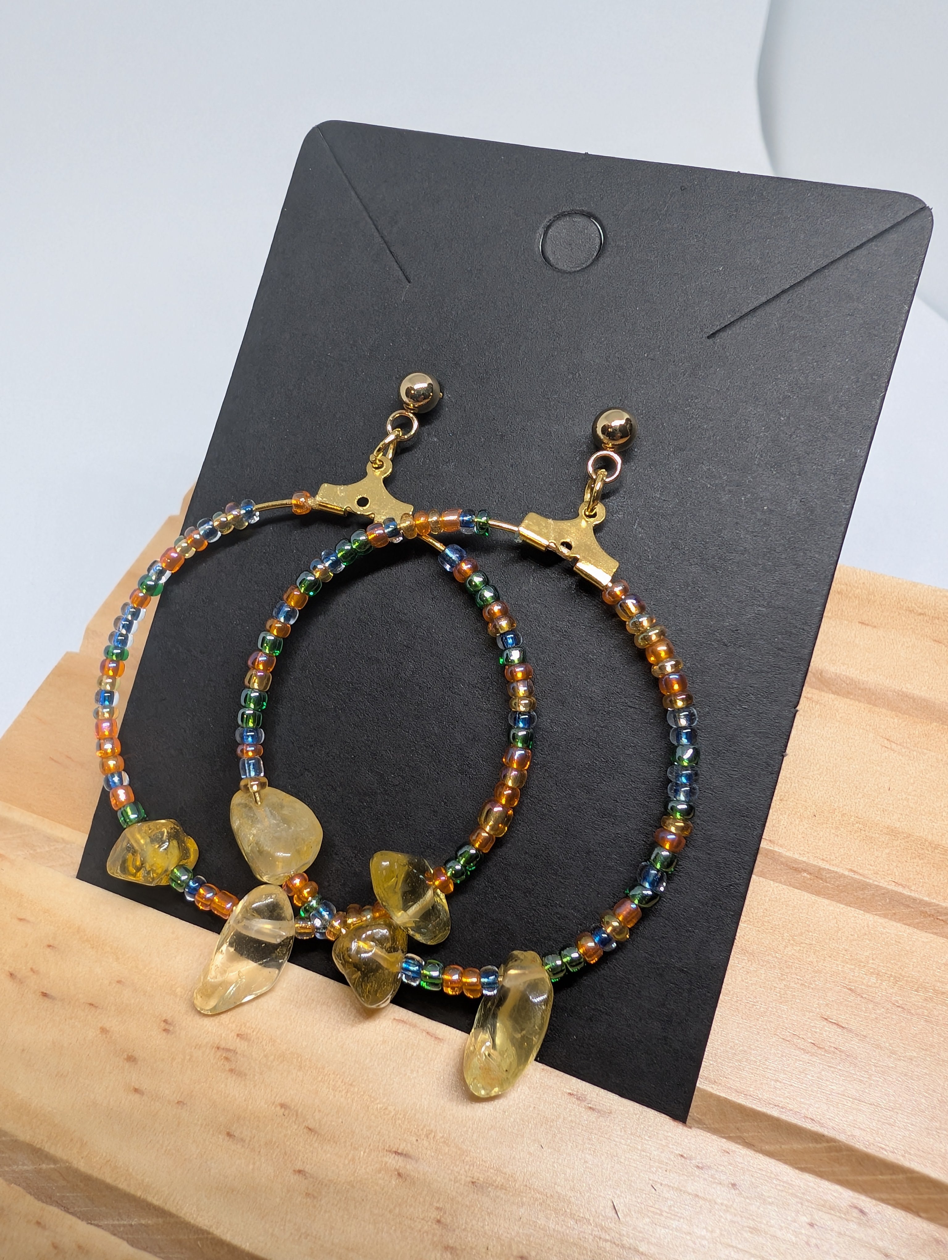 Amber Chip Beaded Hoop, handmade beaded earrings in orange, blue, yellow and gold