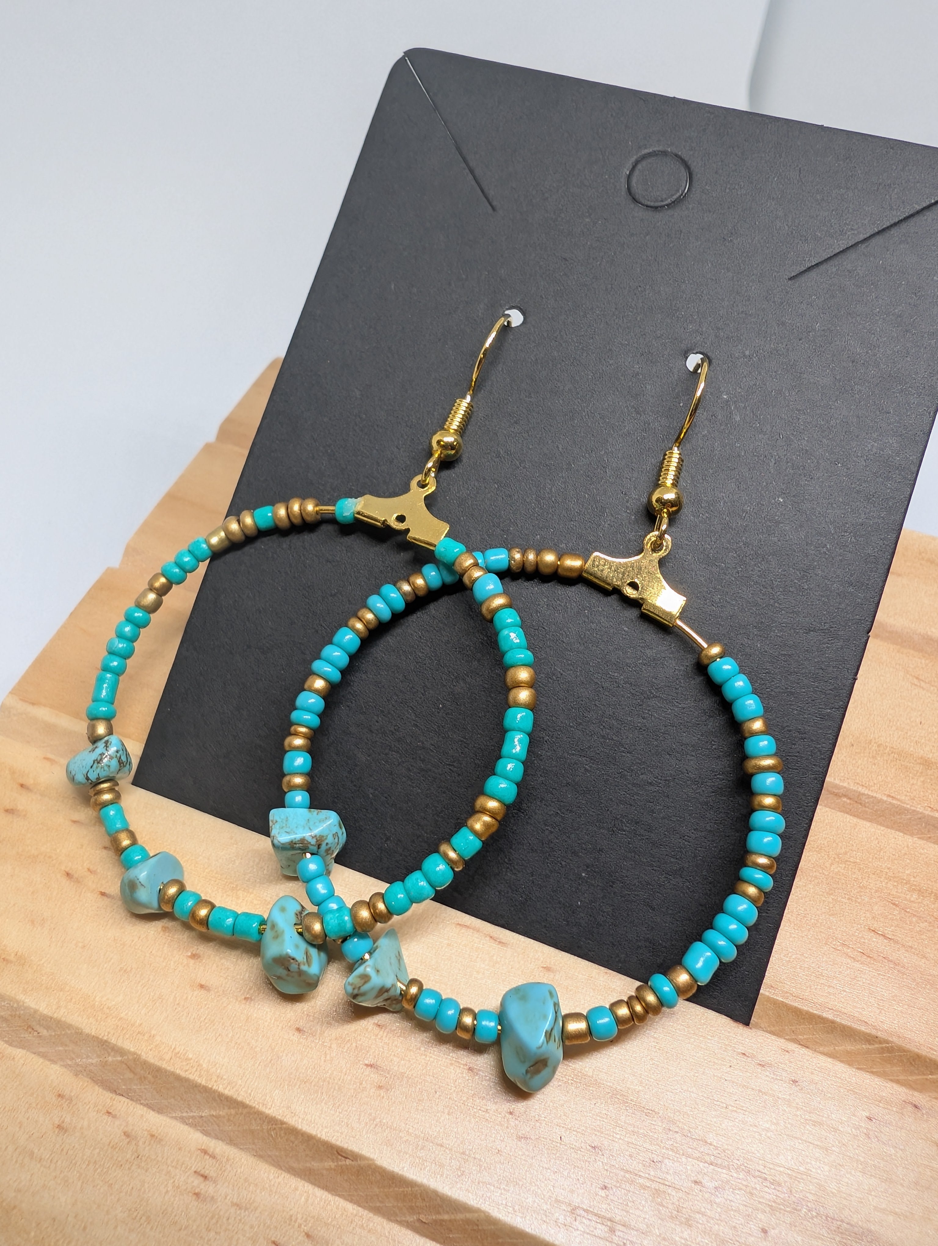 Turquoise And Brass Ring, handmade beaded earrings in blue, green, bronze and gold