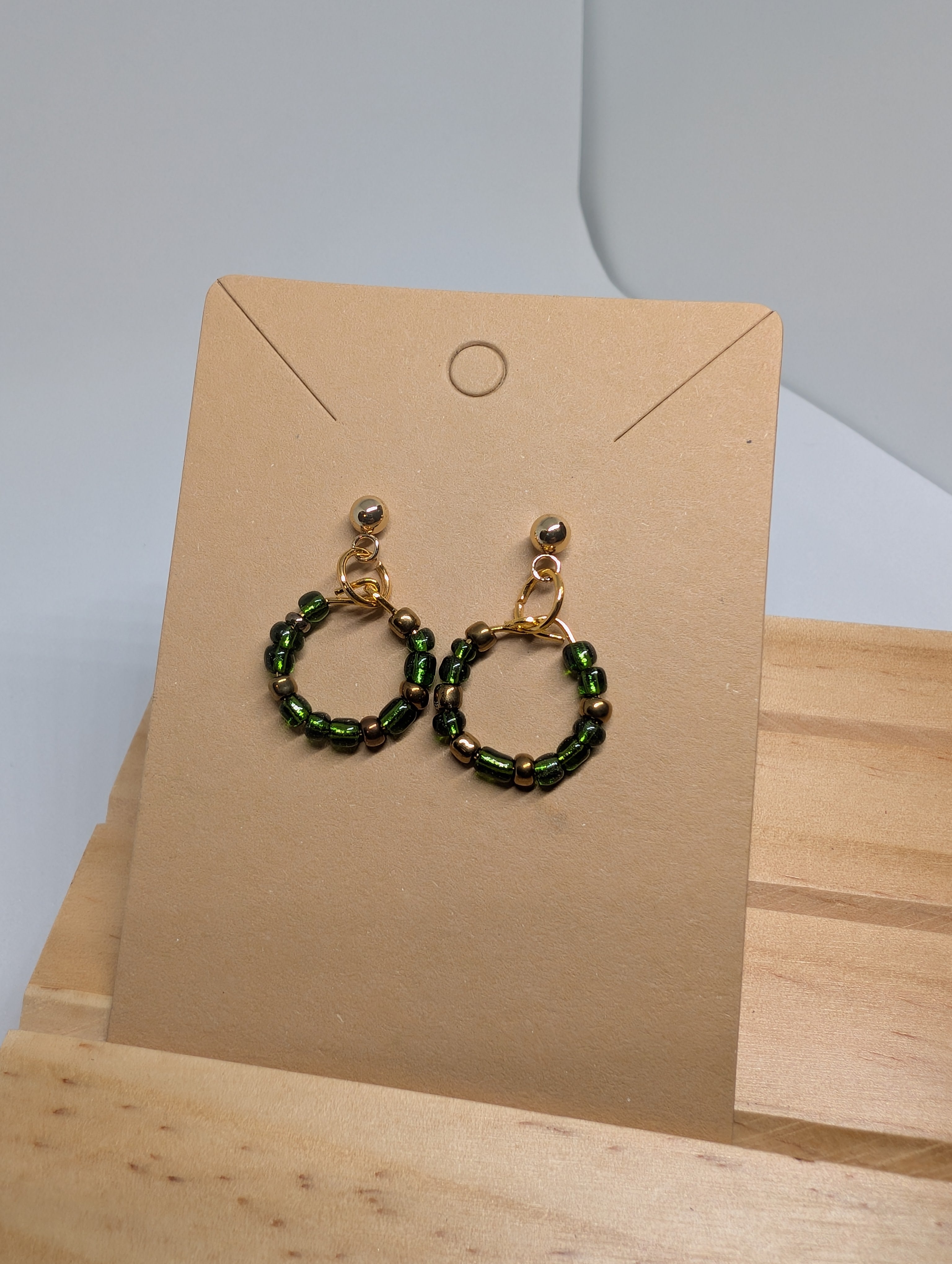 Forest Glint Mini Hoop, handmade beaded earrings in green, bronze and gold