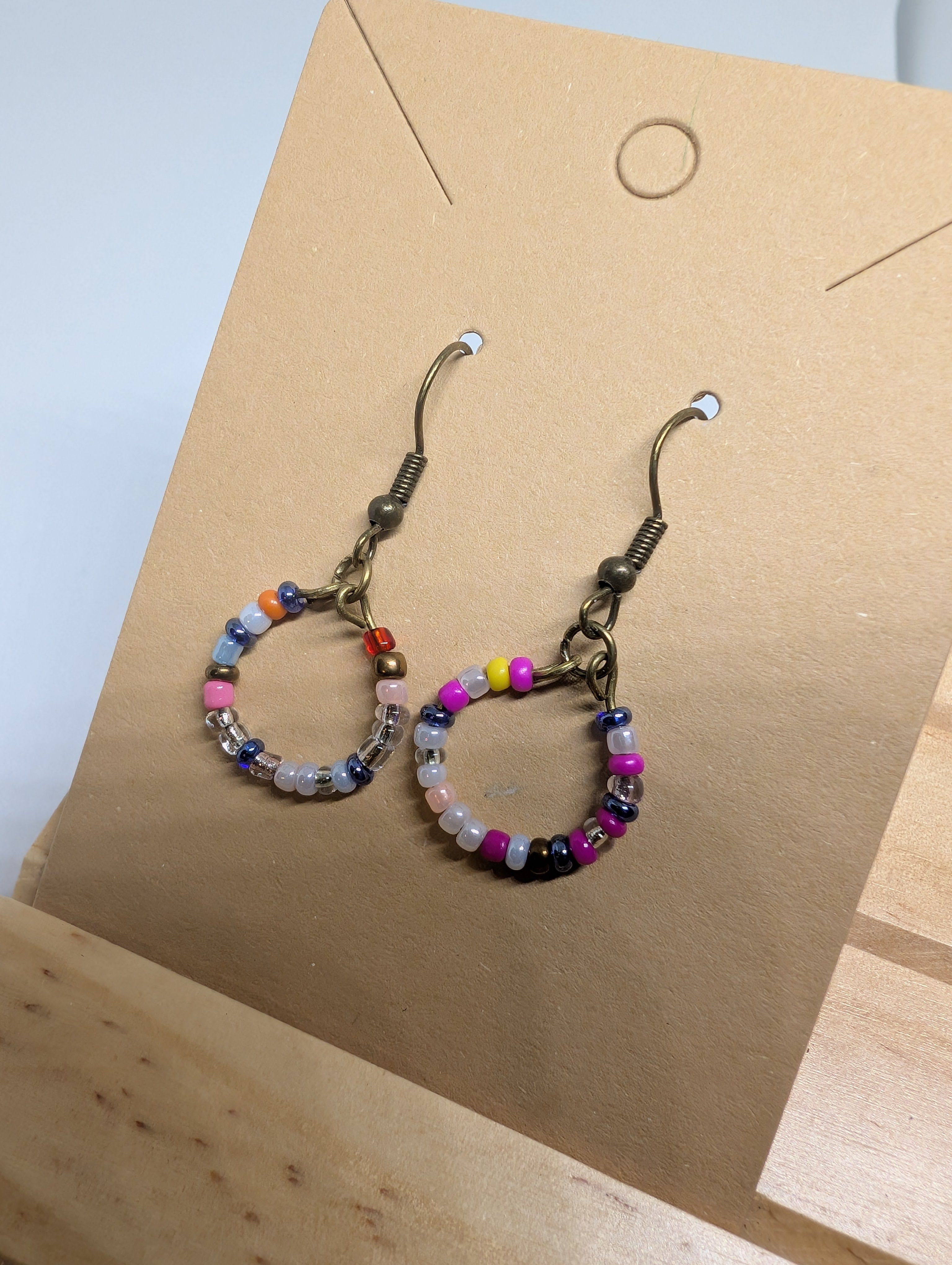 Confetti Scatter Hoop, handmade beaded earrings in multicolour, pink, blue and clear