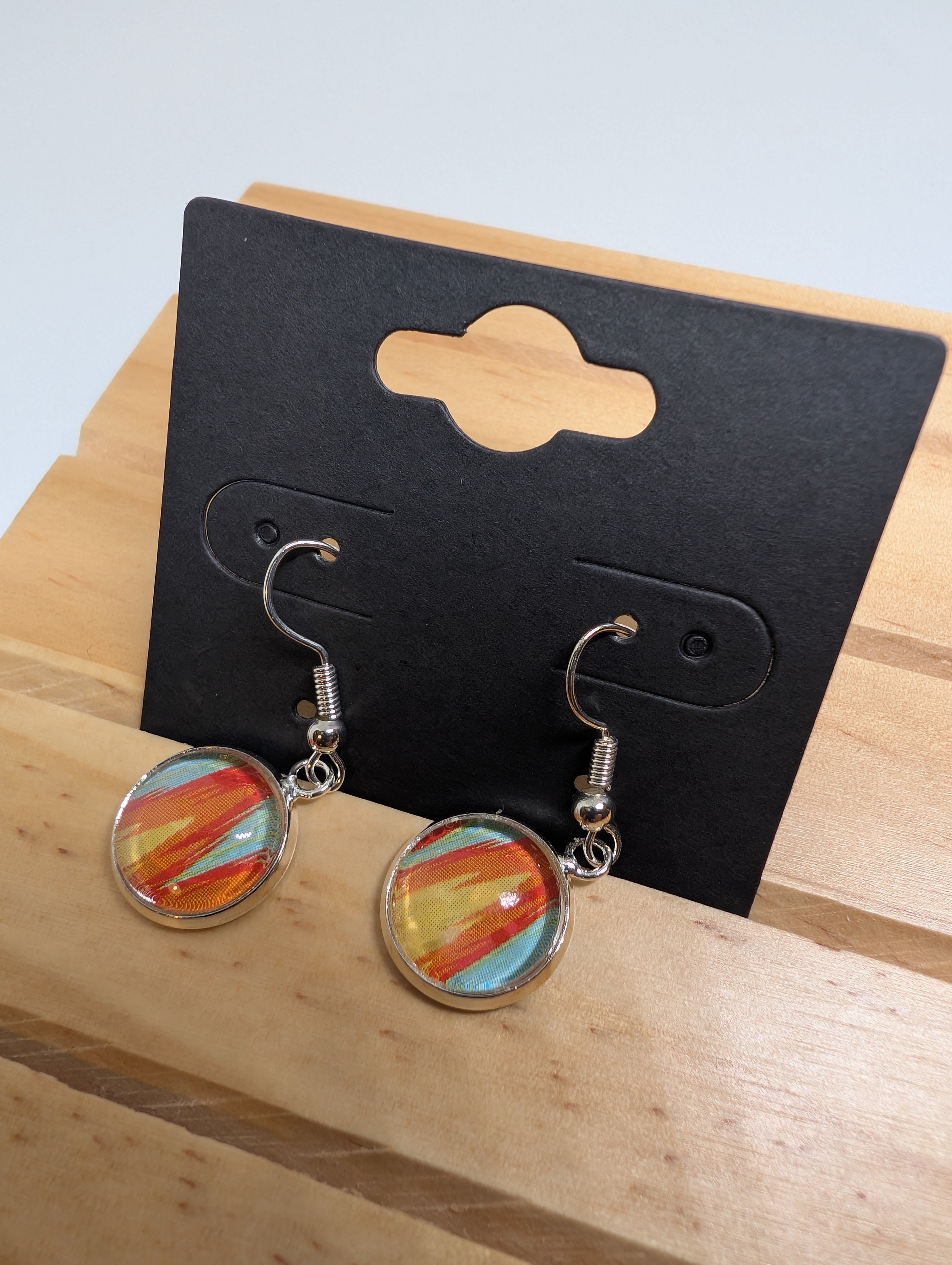 Sunset Stripe Discs, handmade beaded earrings in orange, blue, yellow and red