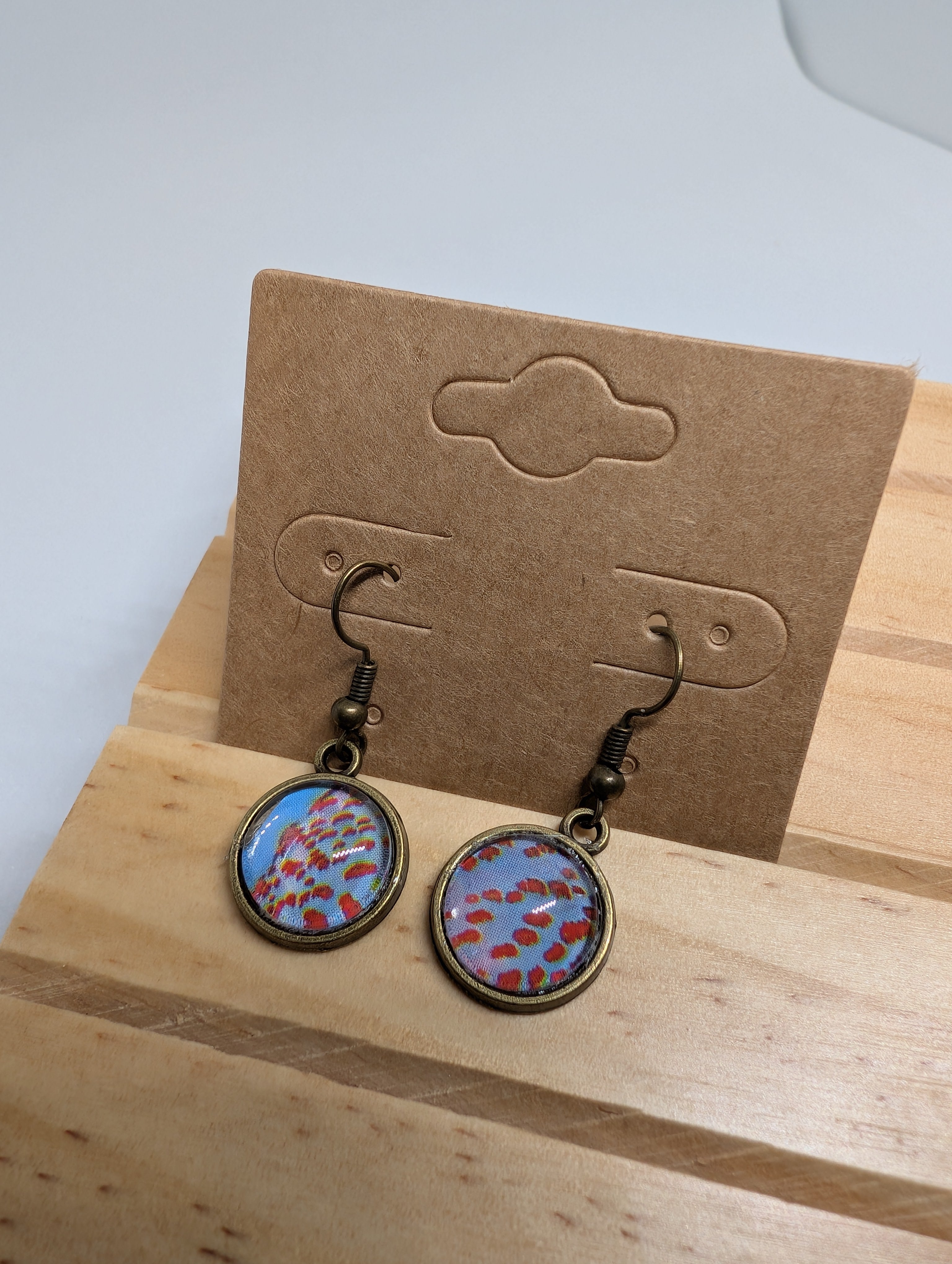 Poppy Field Blue, handmade beaded earrings in blue, red, bronze and orange
